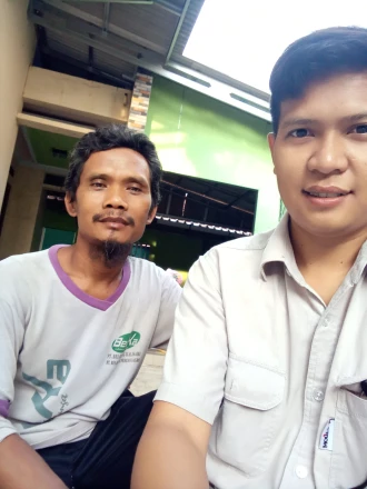 With Bapak Parudin RT . 03